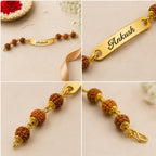 Personalized Name Rudraksha Rakhi – Custom Engraved Gold Finish Metal Bracelet