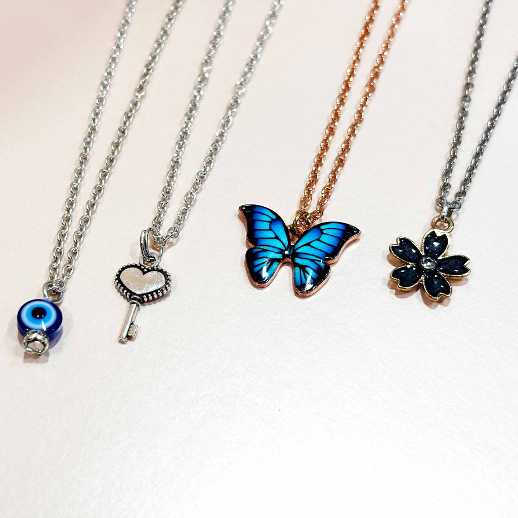 Charming Diva Pendant Set of 4 with Evil Eye Bracelet